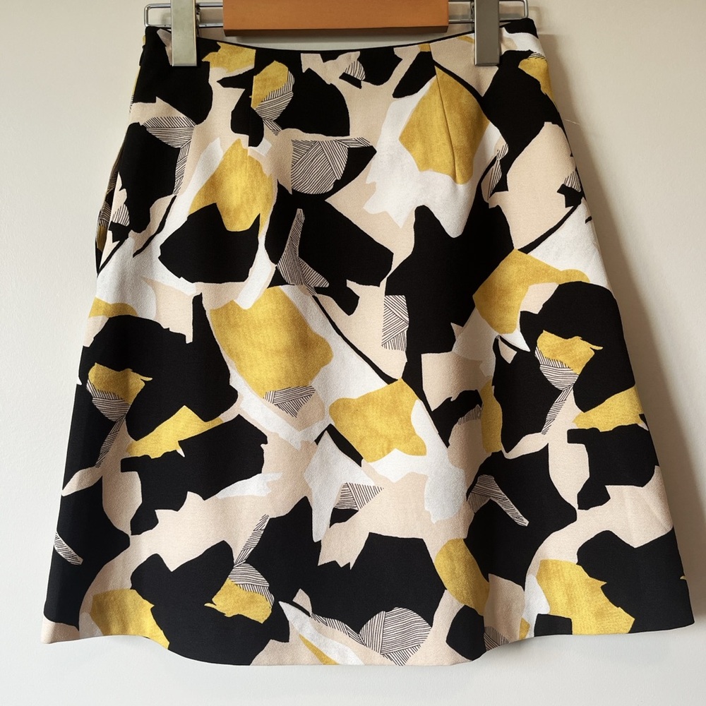 RW&CO. A-Line Skirt in Black and Yellow Abstract Print.